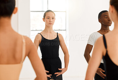 Buy stock photo Shot of a group of ballet dancers practicing a routine in a dance studio