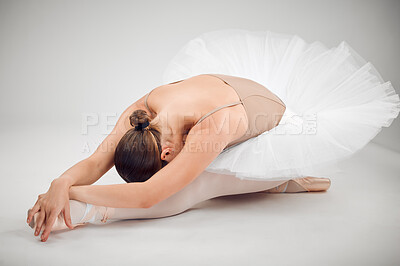 Buy stock photo Full length shot of an attractive young female ballet dancer in studio against a grey background