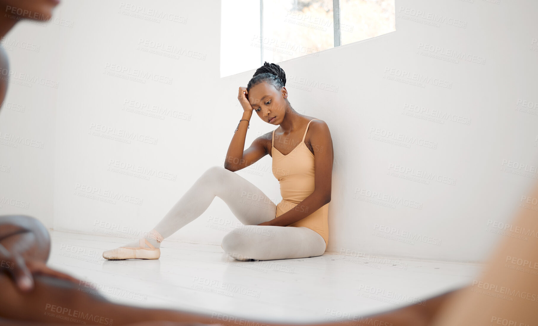 Buy stock photo Ballet school, sad and class with girl on floor for practice, pressure and performance anxiety. Tired, ballerina and thinking with stress at dance academy for recital, learning and difficult routine