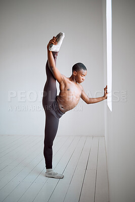 Buy stock photo Shot of a young boy practicing his routine in a dance studio