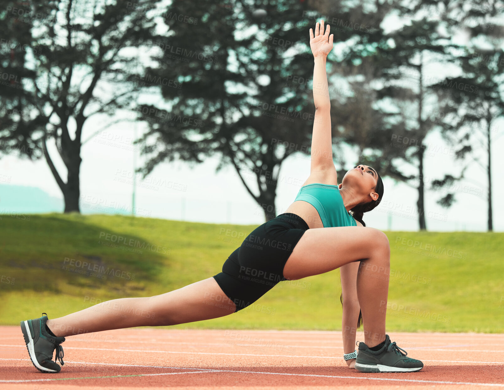 Buy stock photo Woman, fitness and stretching body at stadium for race event, runner and training practice. Female athlete, flexible anatomy and muscle warm up for competition, marathon and running at outdoor arena