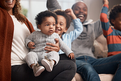 Buy stock photo Excited, black baby and family on sofa for fun, yes and cheering in living room. Parents, children and happiness at home for victory, relationship development and security on couch with support