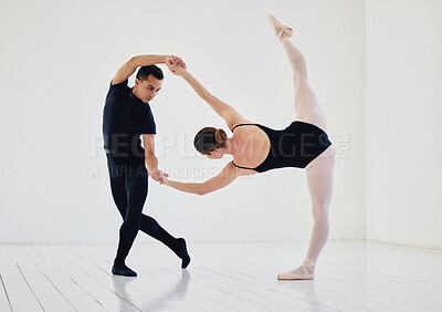 Buy stock photo Studio shot of a young couple rehearsing their routine
