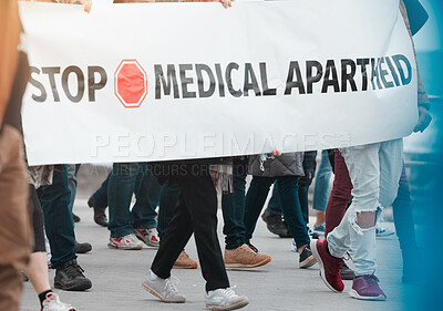 Buy stock photo Crowd, poster and protest in street against covid 19 vaccine, medical or corruption. Banner, community or people legs with billboard for awareness, strike or fight discrimination of meds for virus