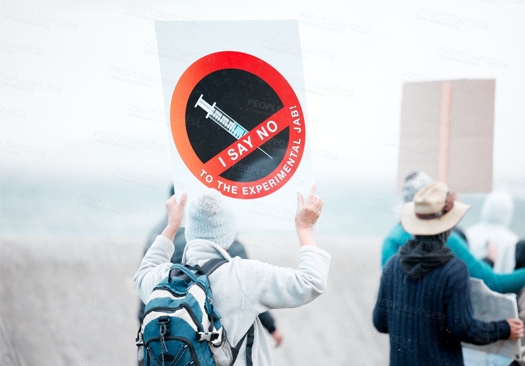 Buy stock photo Covid, human rights and protest with people outdoor for demonstration or political rally. Freedom, government or law and radical group with poster in city, fighting for change, community or society