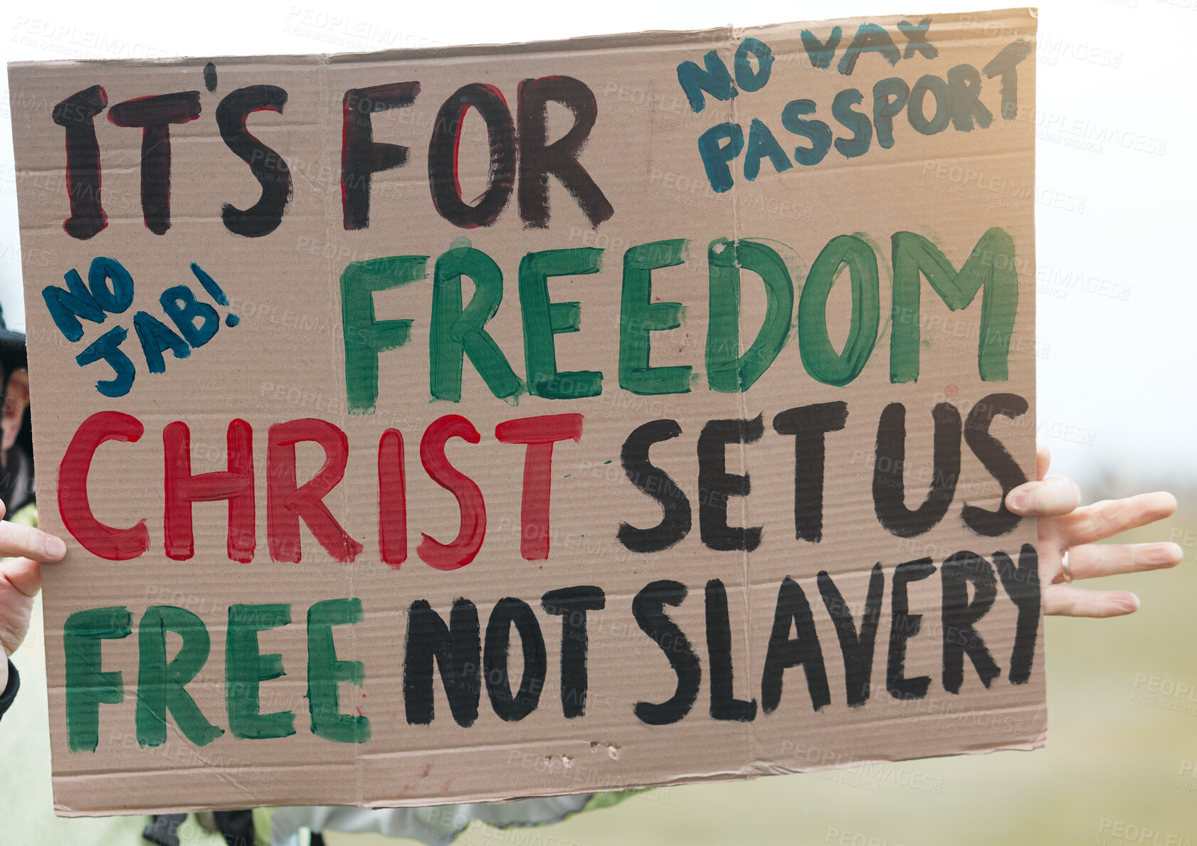 Buy stock photo Poster, anti vaccine and protest with freedom, street and communication with justice, opinion and march. Person in city, cardboard and holding sign with info, paper and covid with choice or option