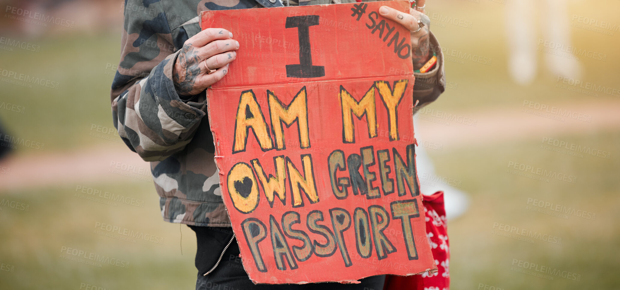 Buy stock photo Person, rally and poster with for vaccine passport, opinion or sign for corona, medical or human rights. Hands, board and fight to stop pharma crime for choice, decision and covid with voice in park