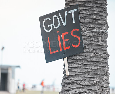 Buy stock photo City, paper and protest banner with sign for government, corruption and political revolution. Tree, billboard and poster with statement in activism for human rights, propaganda or change in elections