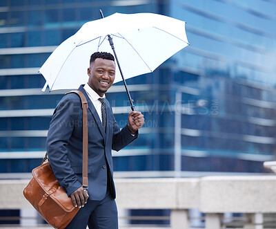 Buy stock photo Rain, city and portrait of business black man walking for morning commute, travel and journey. Professional, corporate worker and person with umbrella with pride for career, job and work in town
