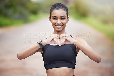 Buy stock photo Active, woman and heart for fitness in outdoors or portrait as runner for exercise or training for race. Indian, female person and sports for cardio, health and wellness for achievement of goal