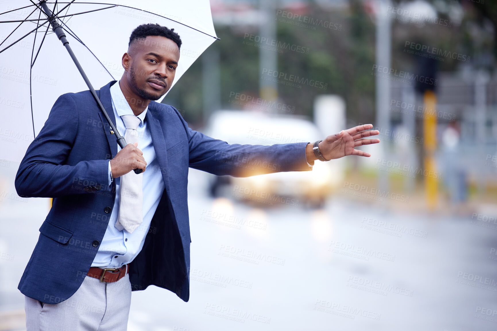 Buy stock photo African business, man and transport with wave, taxi or bus in metro street with umbrella in winter rain. Black businessman, city and road for transportation, travel and stop with hand, sign or call