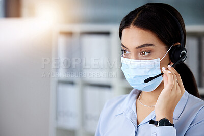 Buy stock photo Face mask, call center and woman consultant in office for online crm consultation with virus. Safety, contact us and agent with headset for telemarketing, technical support or customer service job.