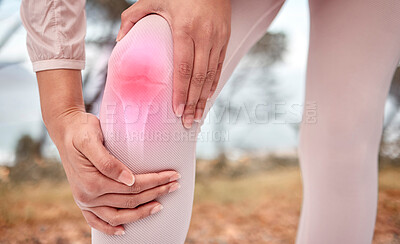 Buy stock photo Closeup shot of an unrecognisable woman experiencing knee pain while exercising outdoors