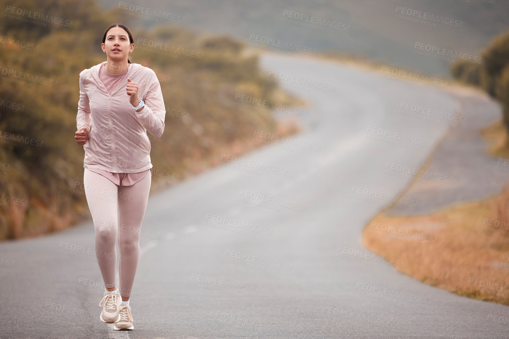 Buy stock photo Road, fitness and woman running for exercise in nature for race, competition or marathon training. Challenge, sports and female athlete runner with cardio workout for energy by mountain trail.