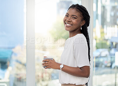 Buy stock photo Shot of a young businesswoman having a cup of coffee at work