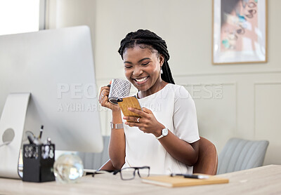 Buy stock photo Shot of a young businesswoman drinking coffee while using a phone at work