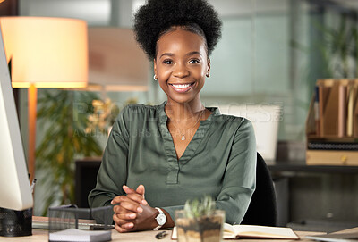 Buy stock photo Cropped portrait of an attractive young businesswoman working at her desk in the office