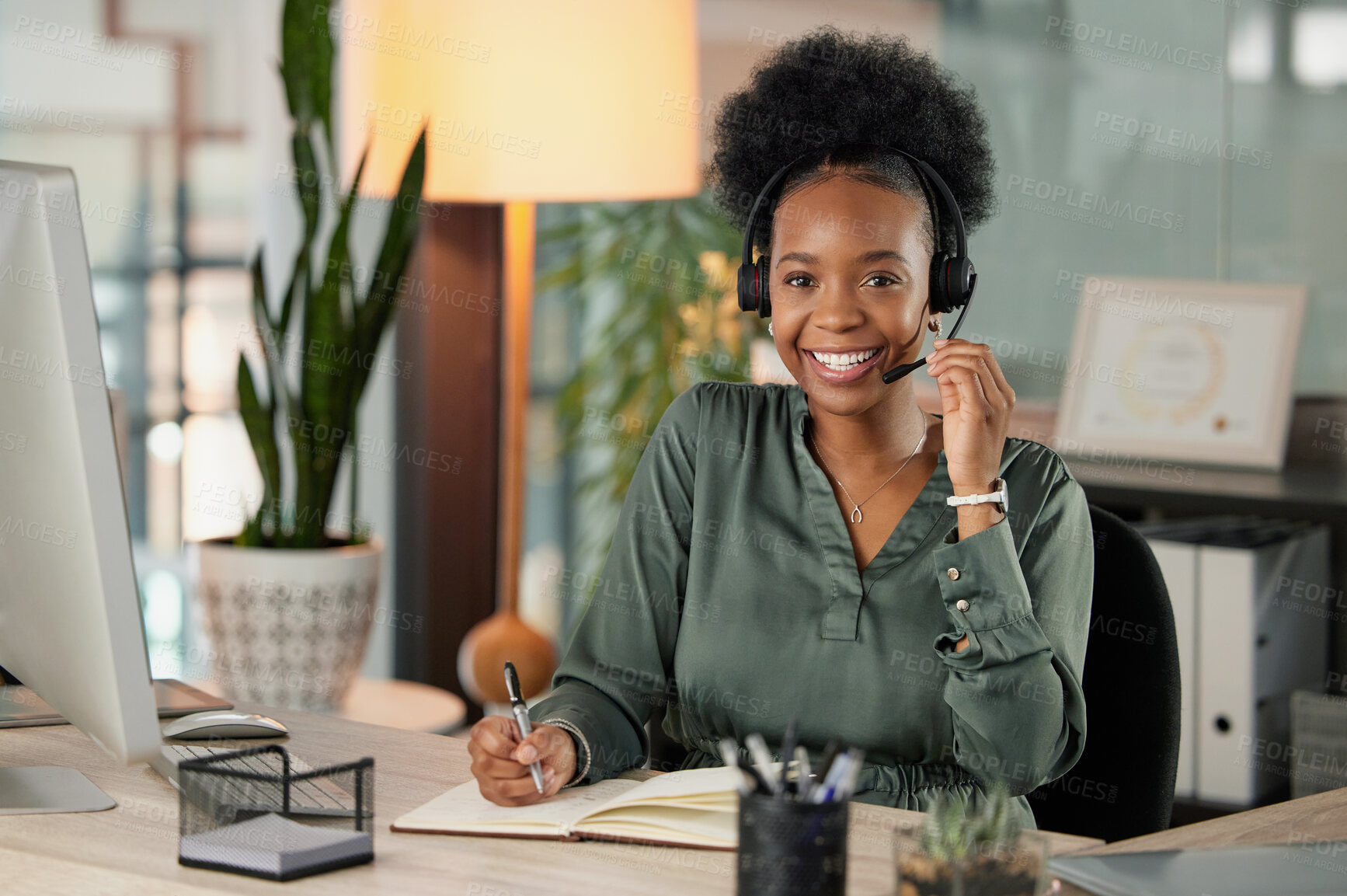 Buy stock photo Cropped portrait of an attractive young businesswoman using a headset to make calls while sitting in her office