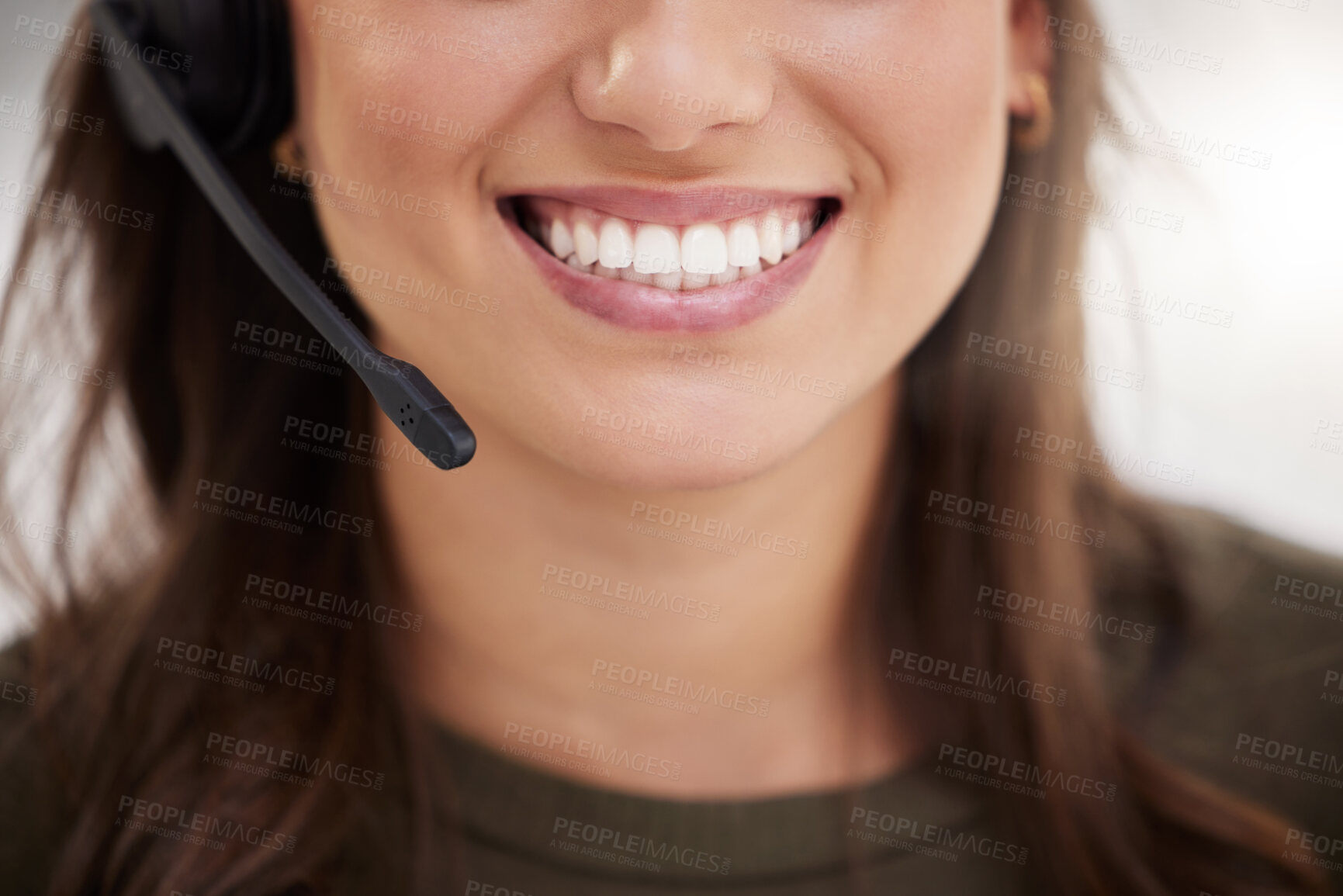 Buy stock photo Closeup shot of a call centre agent working in an office