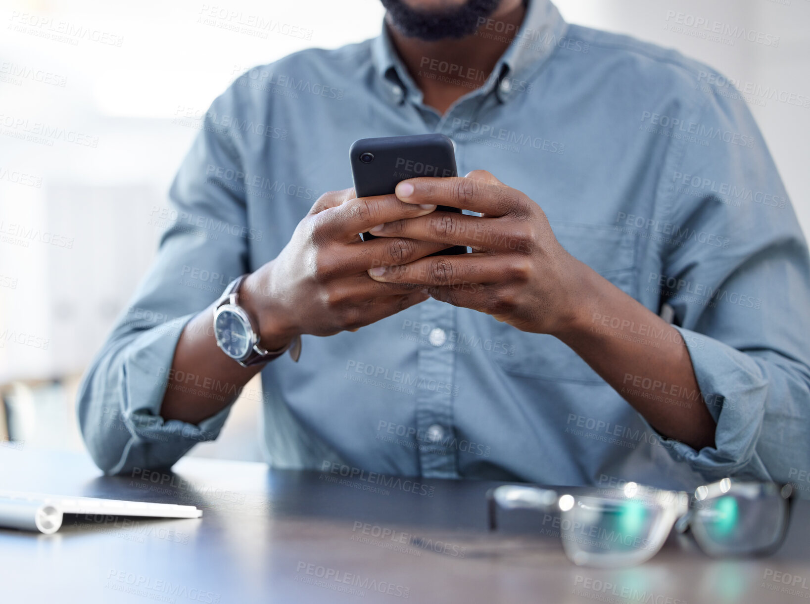 Buy stock photo Businessman, smartphone and typing at desk in closeup for email, communication with tech for company. Male person, hands and message with phone or check for schedule, reminder for meeting on app