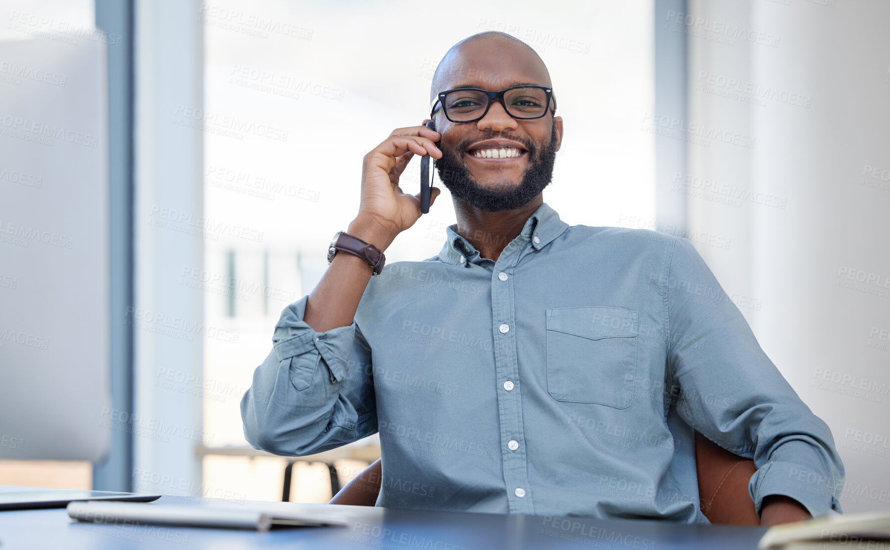 Buy stock photo Smile, portrait of a businessman with cellphone and on a phone call in his workplace office. Online communication, happy and African man with smartphone talking at his modern workspace at desk