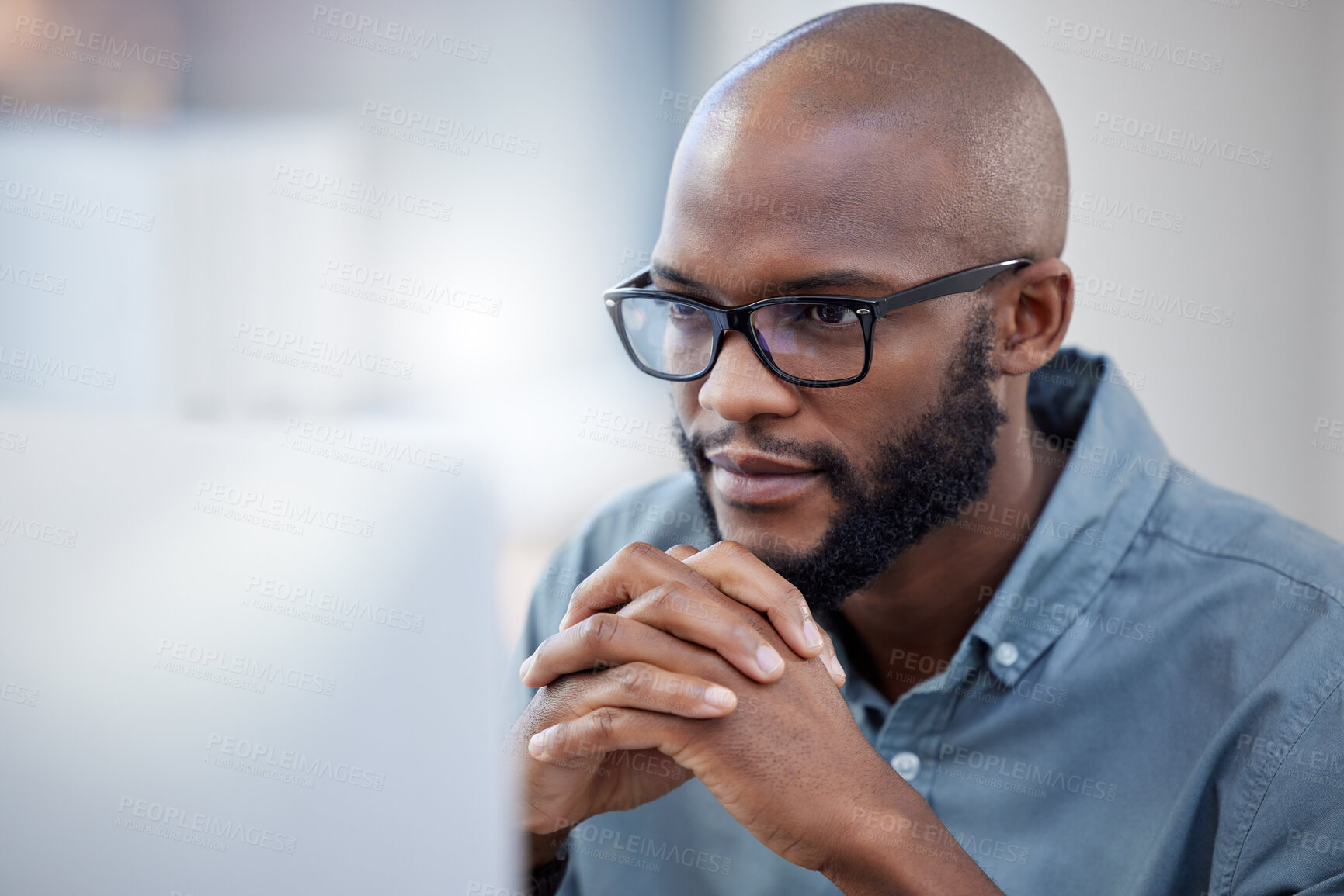 Buy stock photo Black man, thinking and work or office for business, employee and online research for company on internet tech. Reading, thoughtful and planning for corporate, problem solving and idea in workplace