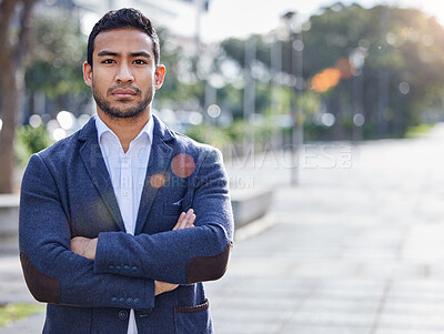 Buy stock photo Shot of a young businessman outside