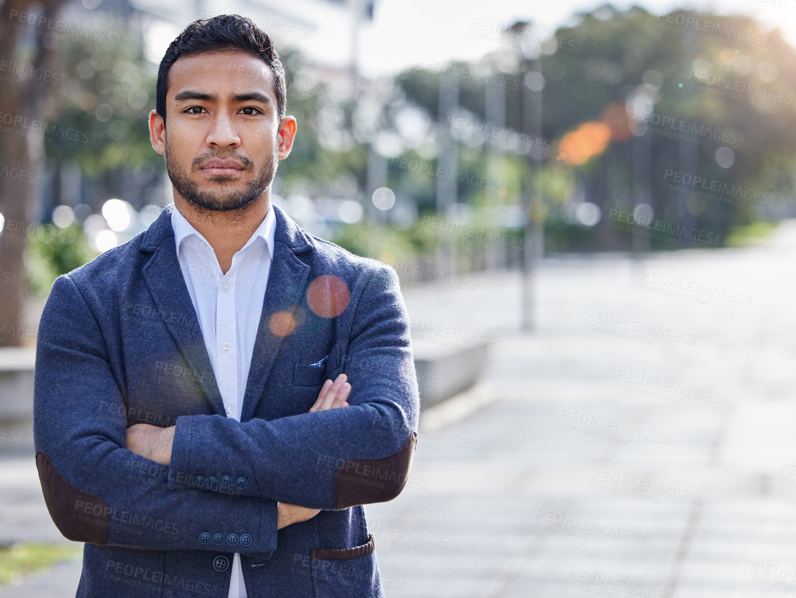 Buy stock photo Shot of a young businessman outside