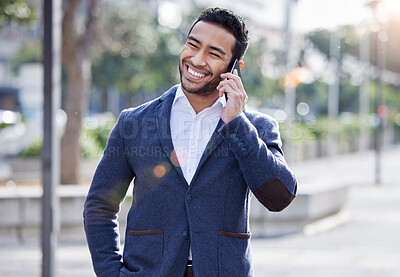 Buy stock photo Happy, businessman and fashion with smartphone for phone call, talking and conversation on morning commute. Male employee, travel and smile for communication, networking with mobile in urban street