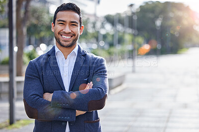 Buy stock photo Shot of a young businessman outside