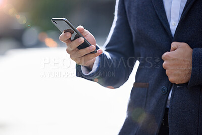 Buy stock photo Hand, business man and phone in city for contact, travel and internet for networking in outdoors. Male person, commute and typing on app for message, lawyer and website for research on urban street
