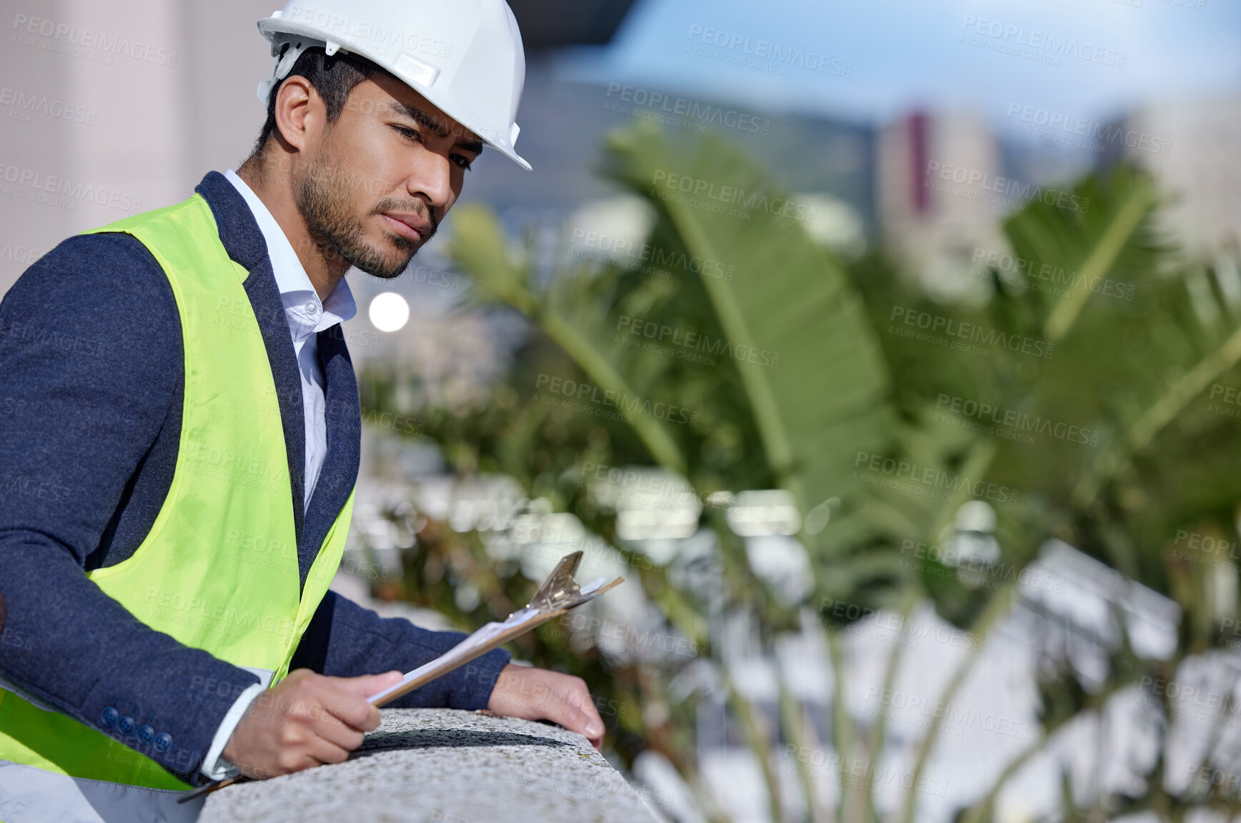 Buy stock photo Man, engineer and clipboard for inspection at building site for management, serious and pride. Male person, project leader and hardhat in Abu Dhabi for construction, architecture and development