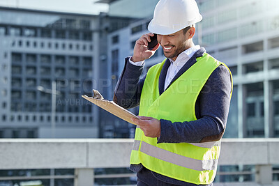 Buy stock photo Engineer, man and clipboard and call in construction site with cellphone, smile and confident. Male person, project manager and hardhat in Abu Dhabi for building, architecture and development in city