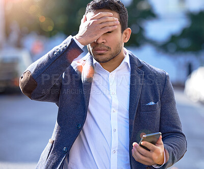 Buy stock photo Businessman, stress and walking with phone, message and outdoor or upset with face palm. Hispanic person ,frustrated and bad news for investments, problem and mobile while worried, work and urban
