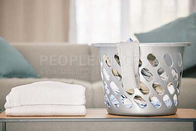 Buy stock photo Shot of a basket of laundry ready to be folded