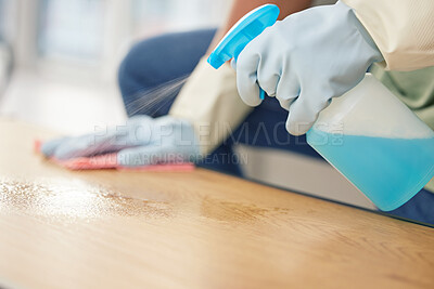 Buy stock photo Cleaning, hands in gloves and spray at table in living room of home for domestic chores or housework. Bacteria, bottle and product to wipe with person in apartment for disinfection or housekeeping