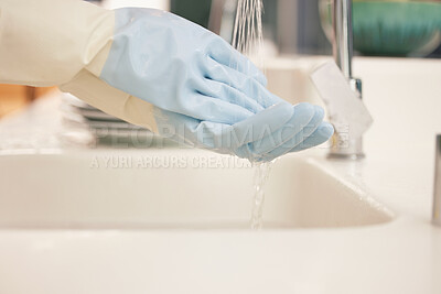 Buy stock photo Shot of a man cleaning his hands underneath running water