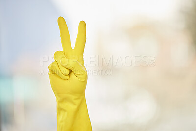Buy stock photo Person, hands or peace sign in gloves for cleaning or good job with mockup space on blurred background. Closeup, window or housekeeper showing satisfaction, support gesture or emoji for great service