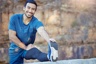 Buy stock photo Portrait, sports and stretching with a man runner outdoor in the mountains for a cardio or endurance workout. Exercise, fitness and smile with a young male athlete getting ready for a run in nature