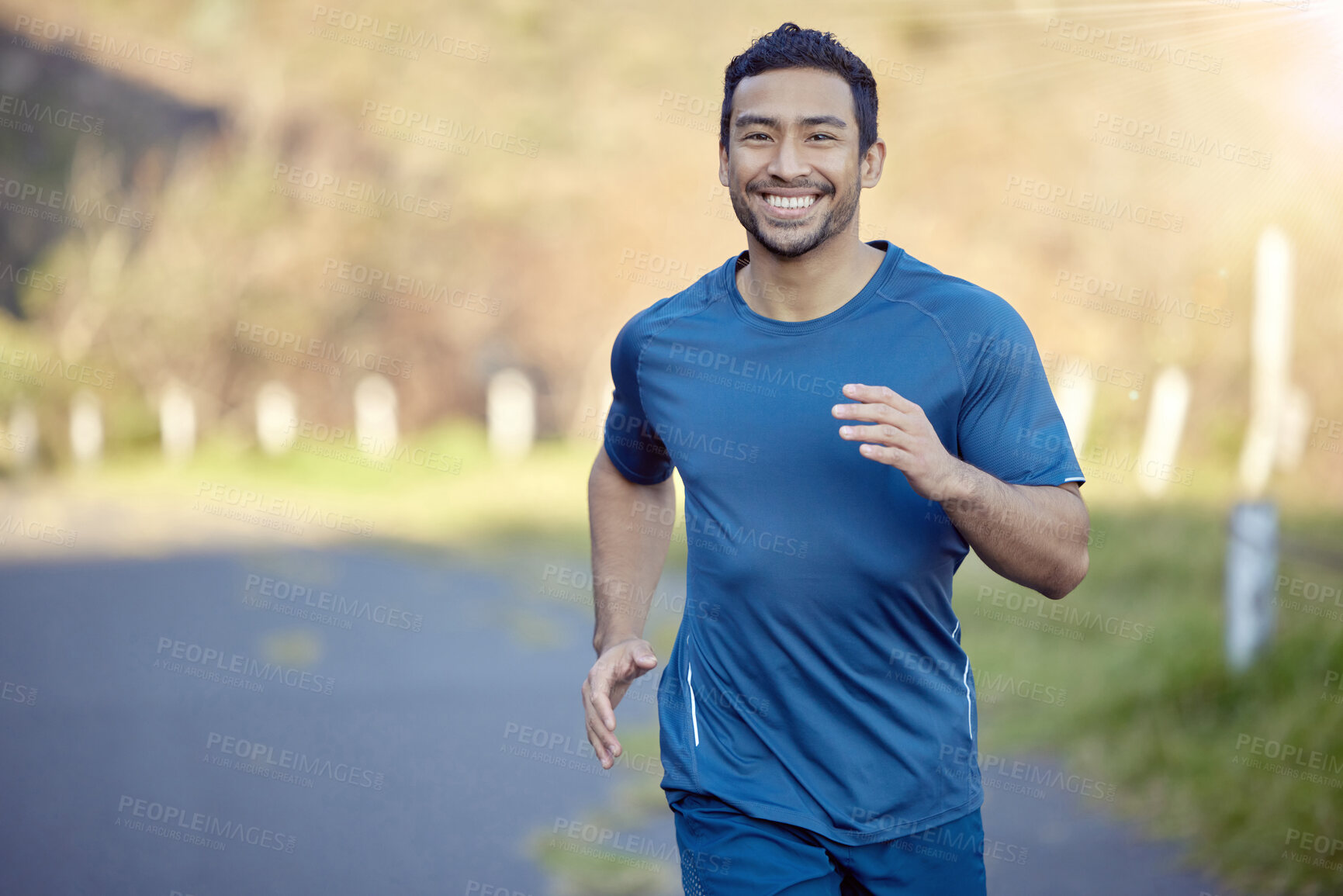 Buy stock photo Man, smile in portrait and run outdoor, fitness and cardio with marathon, sports and athlete in nature. Asian male runner in road, happy with running exercise and training for race with mockup space