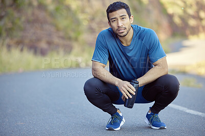 Buy stock photo Man, portrait and break with water for fitness, running or outdoor workout on road or street. Handsome male person, athlete or runner in relax or rest from cardio exercise or training on asphalt