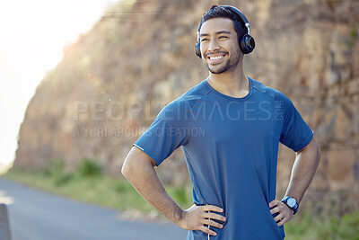Buy stock photo Asian man, headphones and exercise or nature with music playlist or thinking, subscription or podcast. Male person, smile and mountain path for running routine or marathon thoughts, goals or athlete