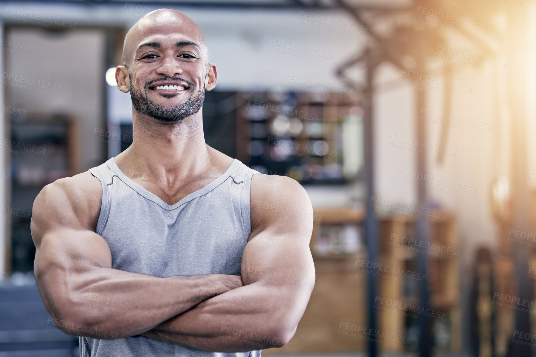 Buy stock photo Man, portrait and arms crossed in gym with muscles for training client, strong body and health career. Pride, smile and face of personal trainer in wellness club for workout, exercise and bodybuilder