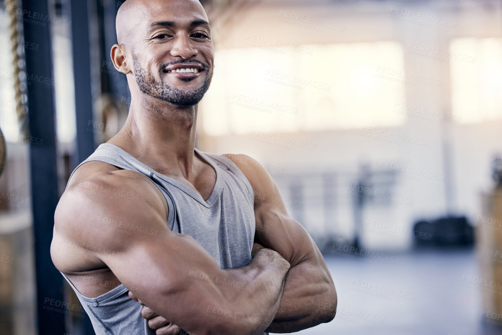 Buy stock photo Man, portrait and arms folded in gym for workout with smile, training or exercise for fitness. Male person, confident or personal trainer in sports club or strong, cardio or wellness in Chicago