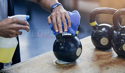 Buy stock photo People, cleaning and gym or kettlebell with detergent for hygiene, health and wellness from bacteria. Cleaner, man and hand to disinfect or sanitise with product for protection or safety from virus 