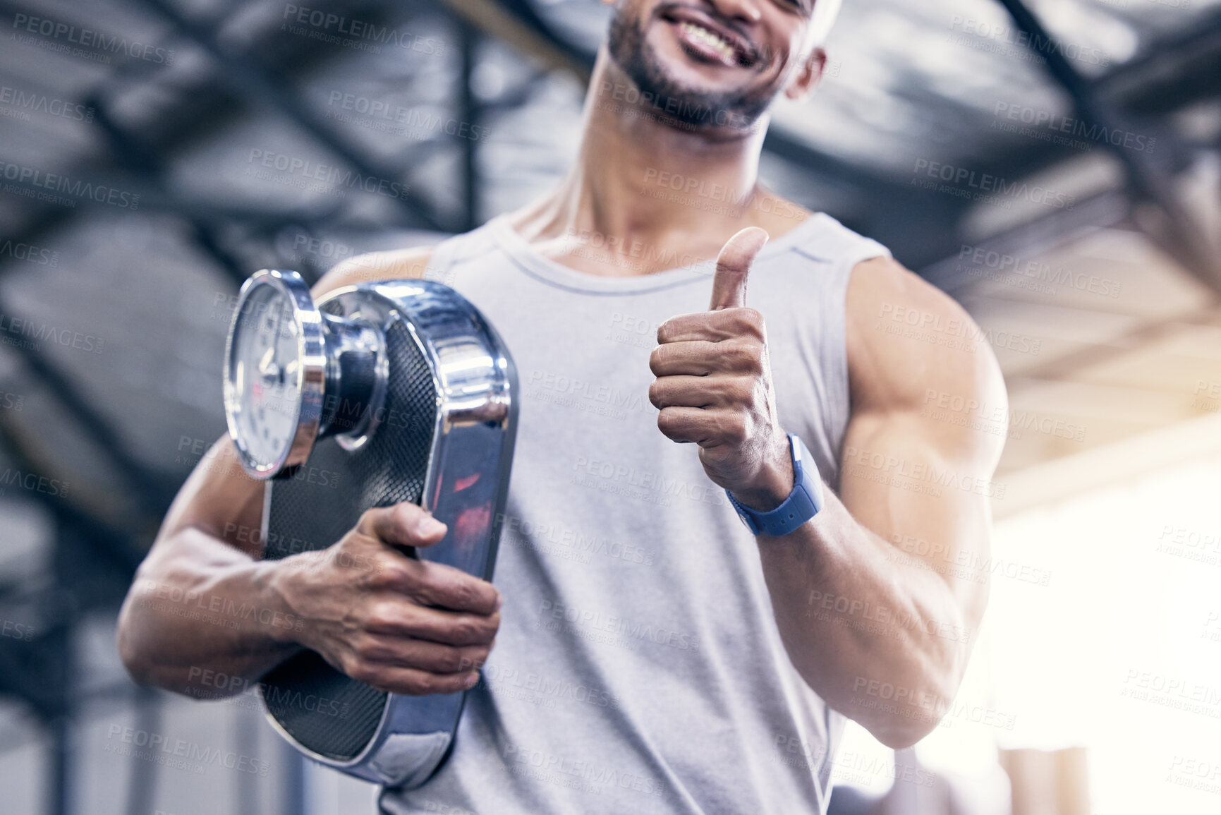 Buy stock photo Man, smile and thumbs up with scale in gym for fitness with weight loss or diet with gesture for well done. Coach, instructor and bodybuilder for goal with never give up, perseverance and health.