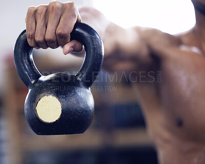 Buy stock photo Hand, kettlebell or weight in gym for training, fitness and exercise to gain muscle for health, strength and wellness. Male person, bodybuilder or athlete lifting iron for workout, cardio or power