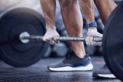 Buy stock photo Man, training and hands with weight in a closeup at the club for workout with equipment. Male trainer, barbell and lifting with hand on the floor at a gym for strength with muscles for exercise.