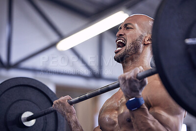 Buy stock photo Shot of a young man working out with a barbell at the gym