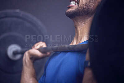Buy stock photo Shot of an unrecognisable man working out with a barbell at the gym